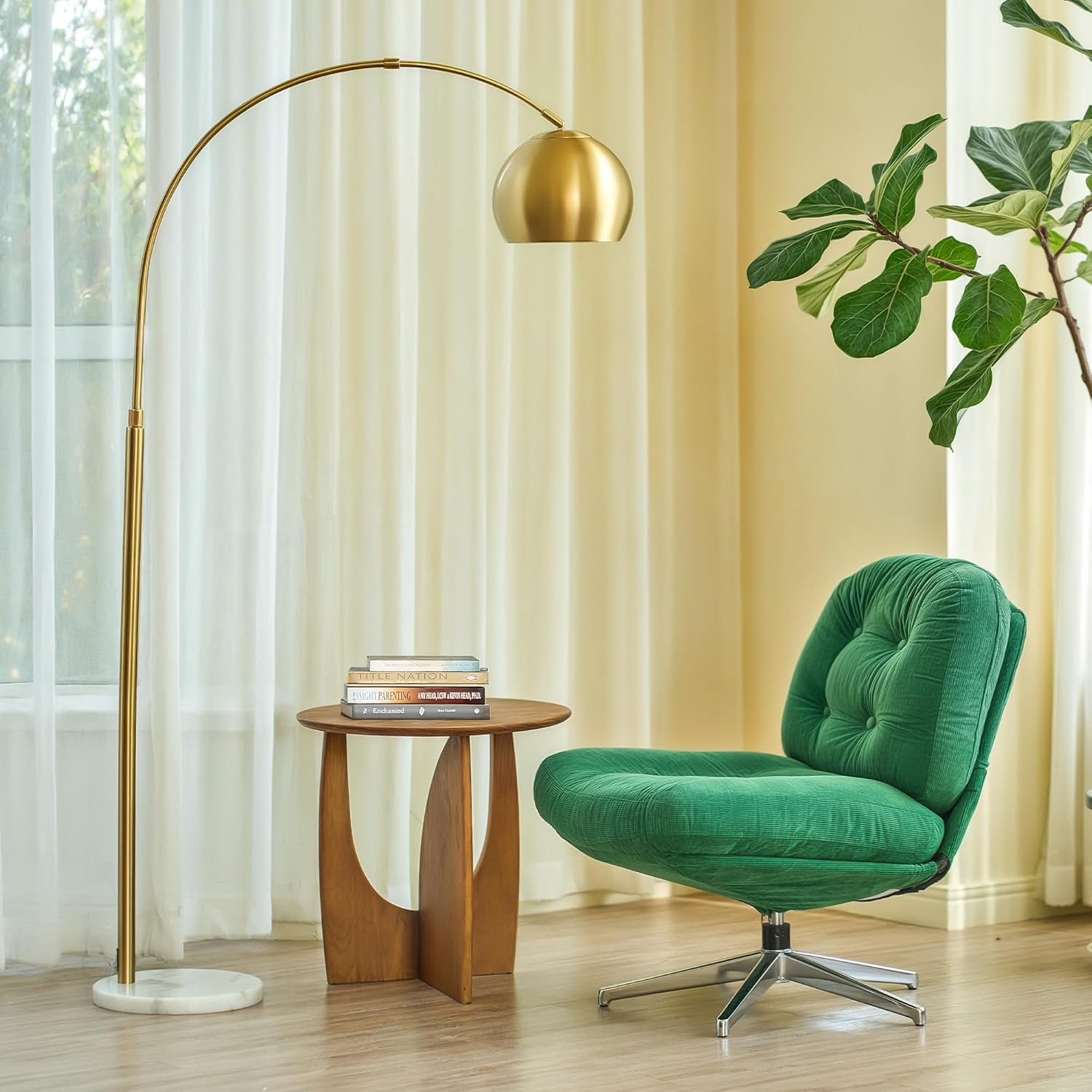 Gold arc floor lamp with adjustable metal shade and marble base